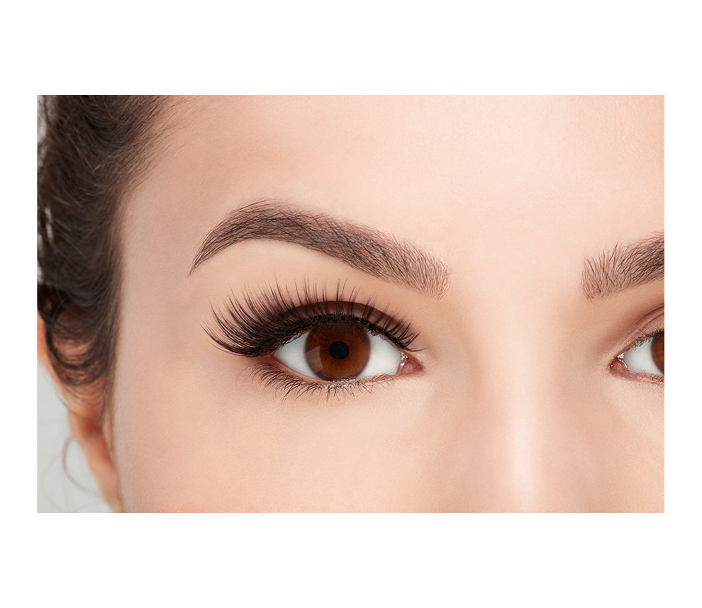 Ardell's 3D Faux Mink 857 eyelash on a model with an open eye showing the lash when worn
