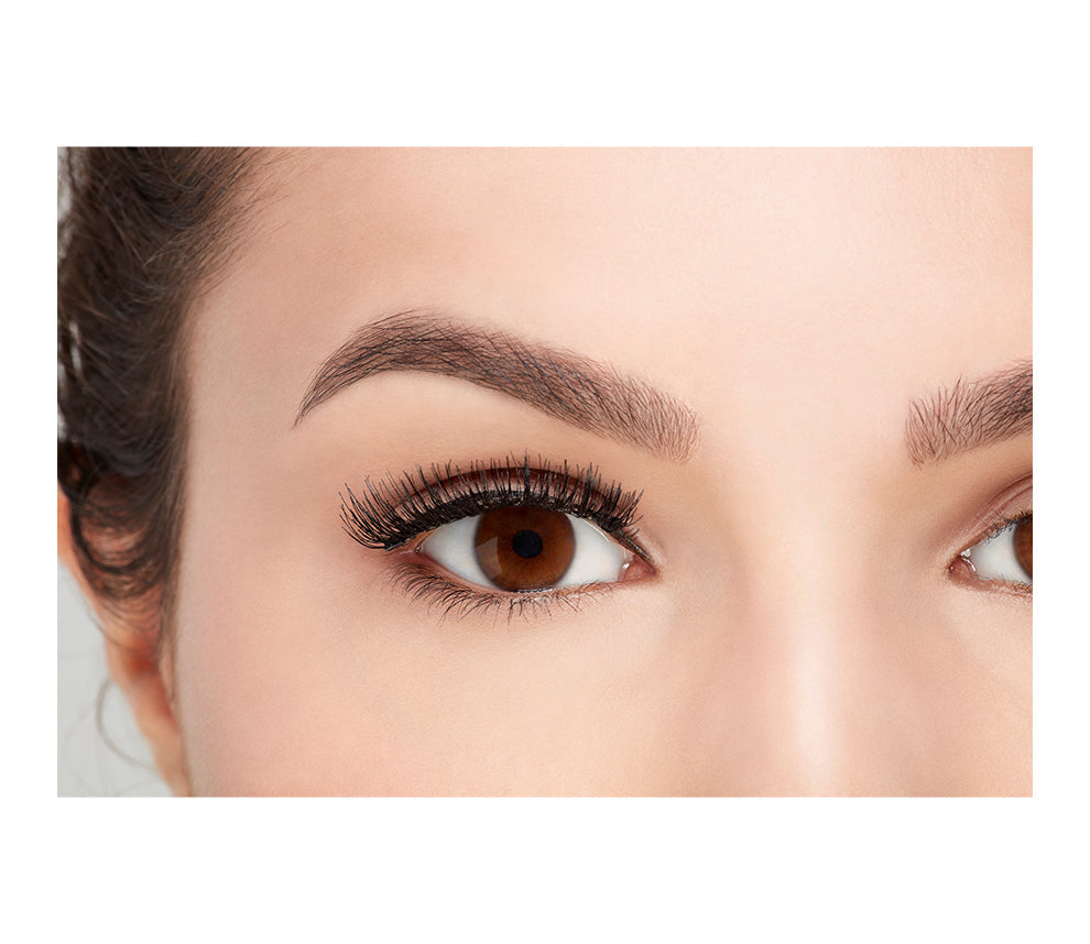 Close-up of a model's open right eye wearing an Ardell Magnetic Double Lash 110 faux lash