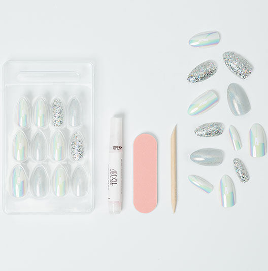 Ardell holographic and silver glitter press-on nail kit with adhesive pen, nail file, and cuticle stick for easy at-home application.