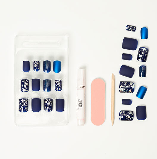 laid down separately a complete artificial nail set with tools of Ardell Nail Addict Artificial Nail - Matte Blue variant