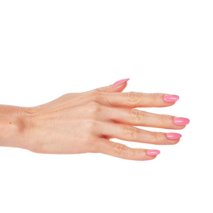 Side profile of fingers polished in Gumball gel by Ardell, revealing a fun candy-pink finish.