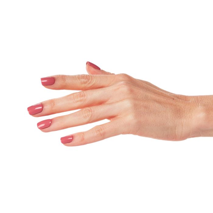 Side view of hand displaying Ardell Simply Charmed gel polish in a radiant rosy pink tone.