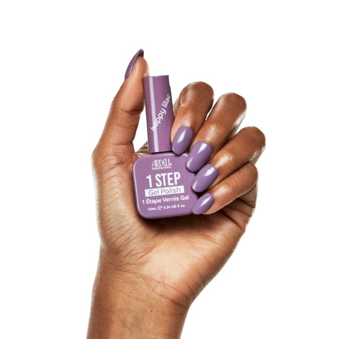 Model hand shot in Ardell Happy Lilac polish, highlighting a smooth and vibrant lilac-pink gel finish.