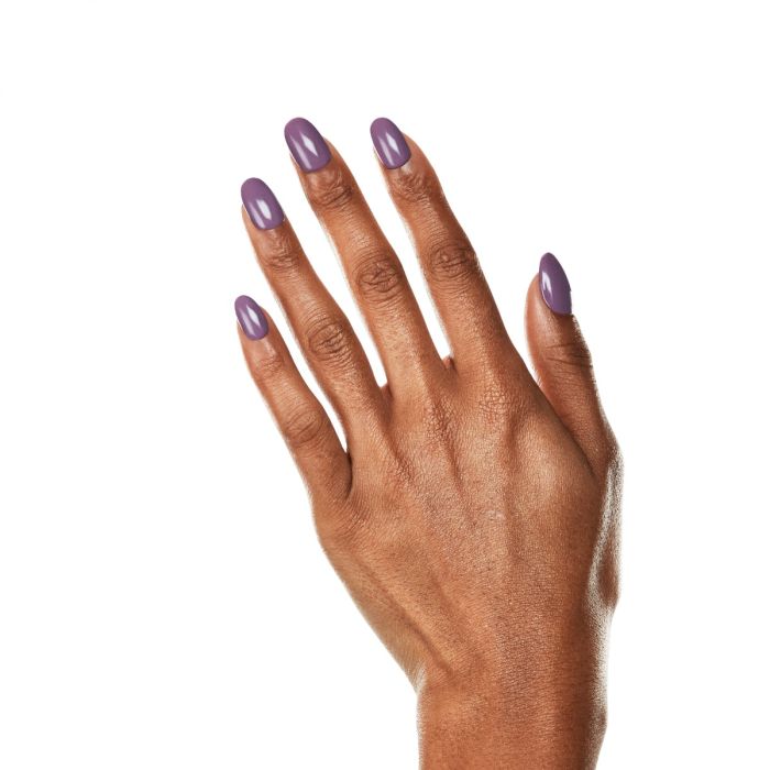 Natural hand pose with Ardell Happy Lilac polish, offering a joyful and wearable pastel-purple manicure.