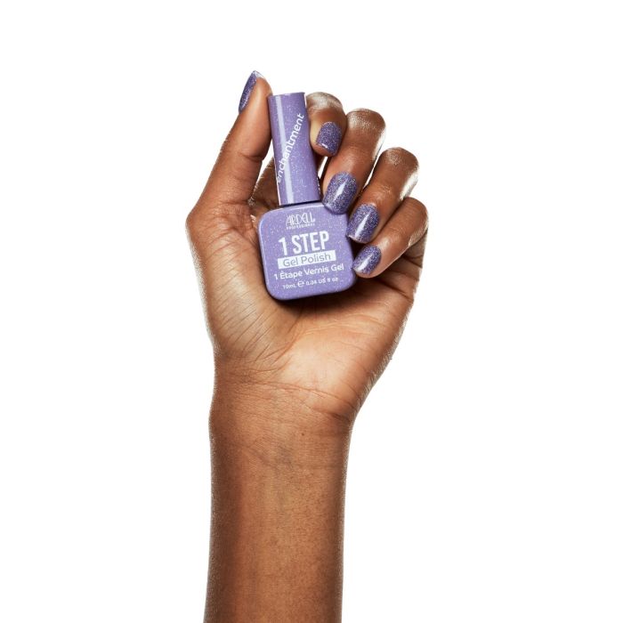 Model hand wearing Ardell Enchantment gel polish, highlighting its delicate lavender and white speckle combo.