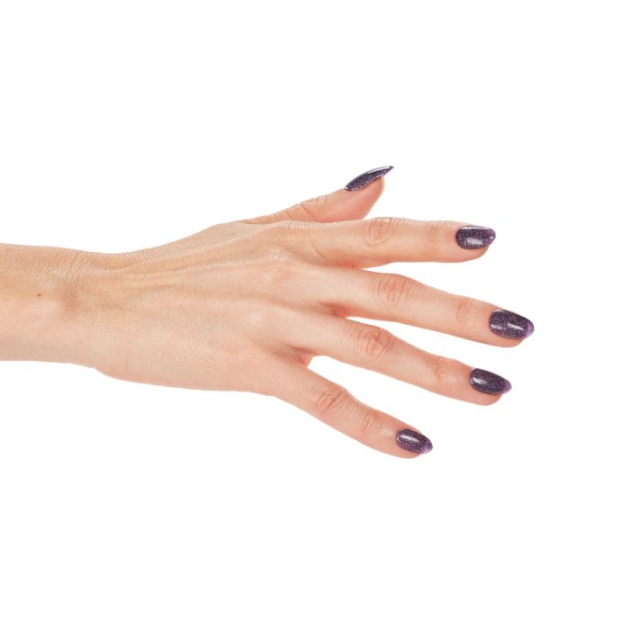 Close-up of hand in Ardell Sparkle & Twinkle polish, a bold purple shade with multidimensional shimmer.