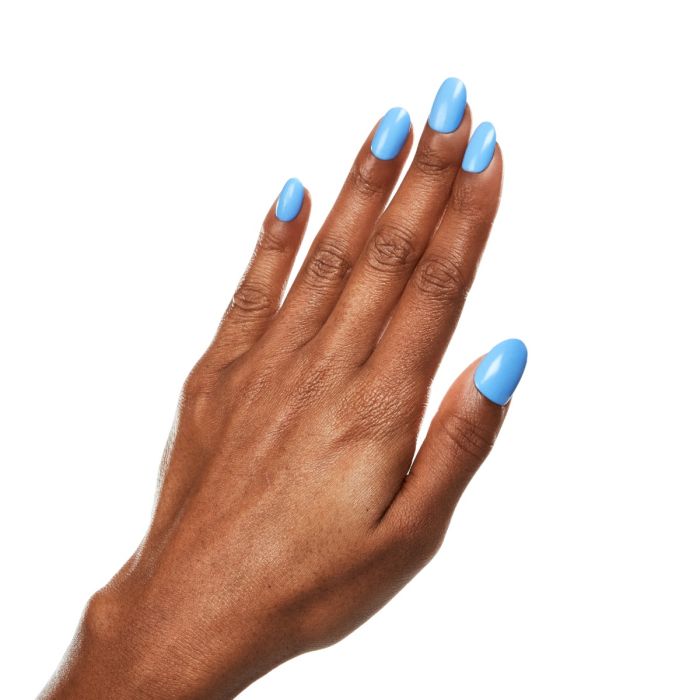 Model hand pose featuring Ardell Calm Waters polish, a smooth, sky-toned blue with a glossy finish.