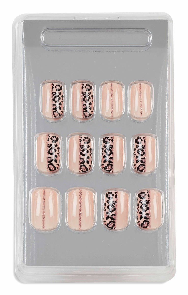 Close-up of Ardell cheetah accent and glitter press-on nails in tray with a mix of nude and glam designs for statement nails.