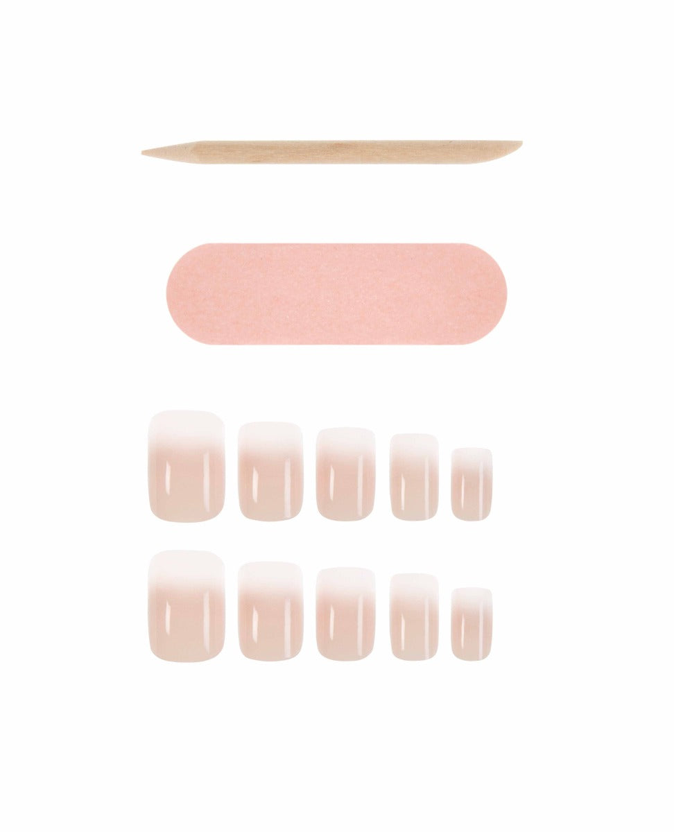 Short square Ardell press-on nails with natural French ombré finish, includes file and wooden stick.