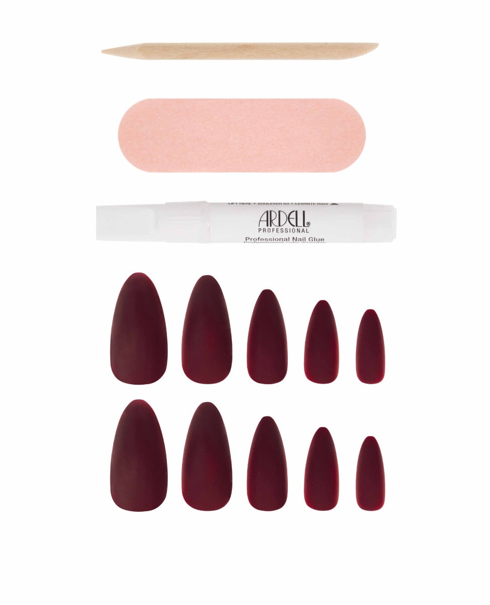 Ardell nail kit with matte burgundy almond nails, professional glue, buffer, and cuticle pusher.
