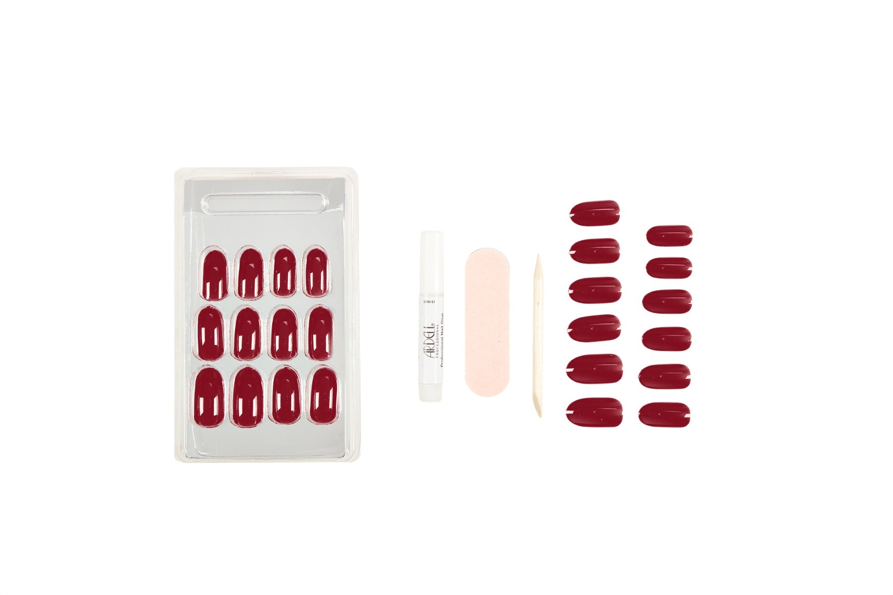 Ardell Nail Addict red press-on nails set with glue, file, and cuticle stick for easy at-home manicure application.