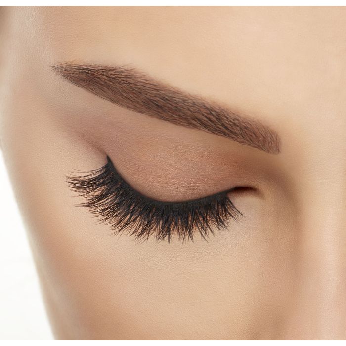 Closed-eye look with Ardell 861 lashes showing natural taper and medium-full flutter.