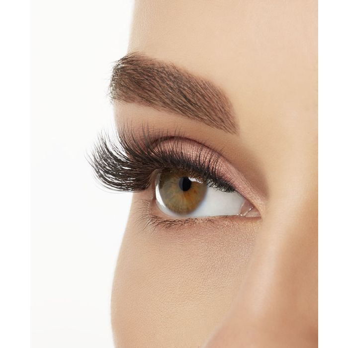 Side eye profile of Ardell 861 lashes highlighting upward curl and soft lash layering.