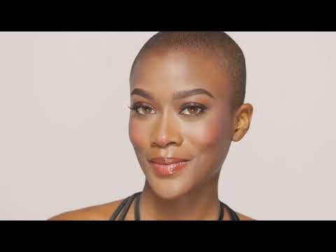 Model with flawless glam makeup and voluminous Ardell lashes for a confident, photo-ready finish.