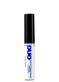 A close-up of DUO Quick-Set Striplash Adhesive bottle with black cap, known for its fast-drying and long-lasting formula.