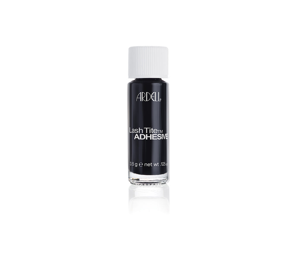 Capped bottle of Ardell LashTite Adhesive - Dark for faux lashes standing upright