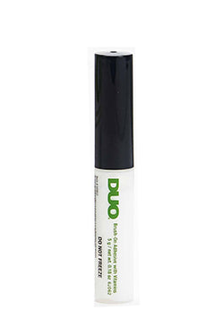 DUO Brush-On Strip Lash Adhesive with Vitamins in a sleek tube for easy and precise false eyelash application.