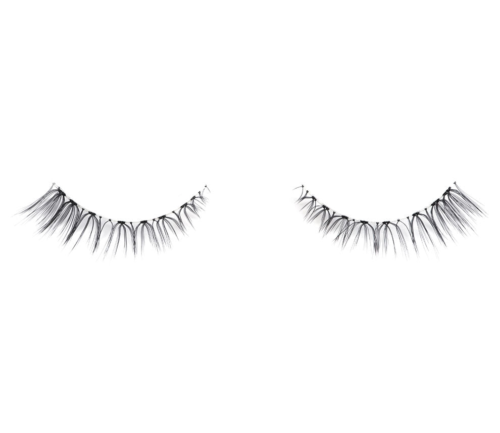 Pair of Ardell Soft Touch 150 false lashes side by side short featuring light volume short length fibers 