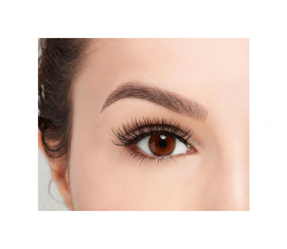 Close-up of a model's open right eye wearing an Ardell Remy Lash 778 false lash