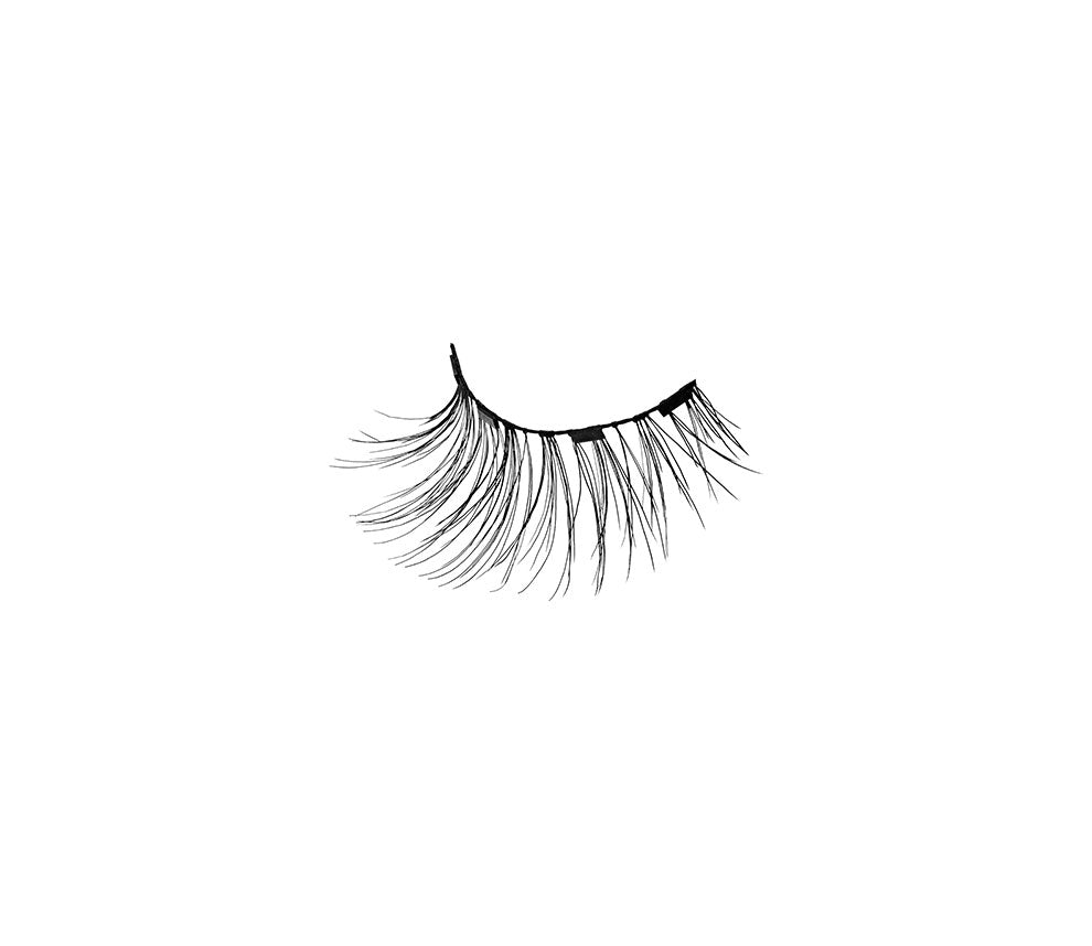 Single Ardell Magnetic Wispies 113 faux lash for the right eye showing tiny magnets & lash fibers
