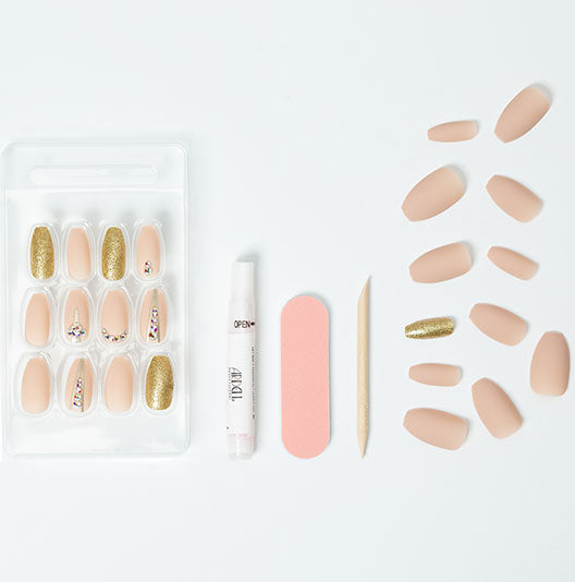 laid down separately a complete set with tools of  Ardell Nail Addict Artificial Nail -Nude Jeweled variant