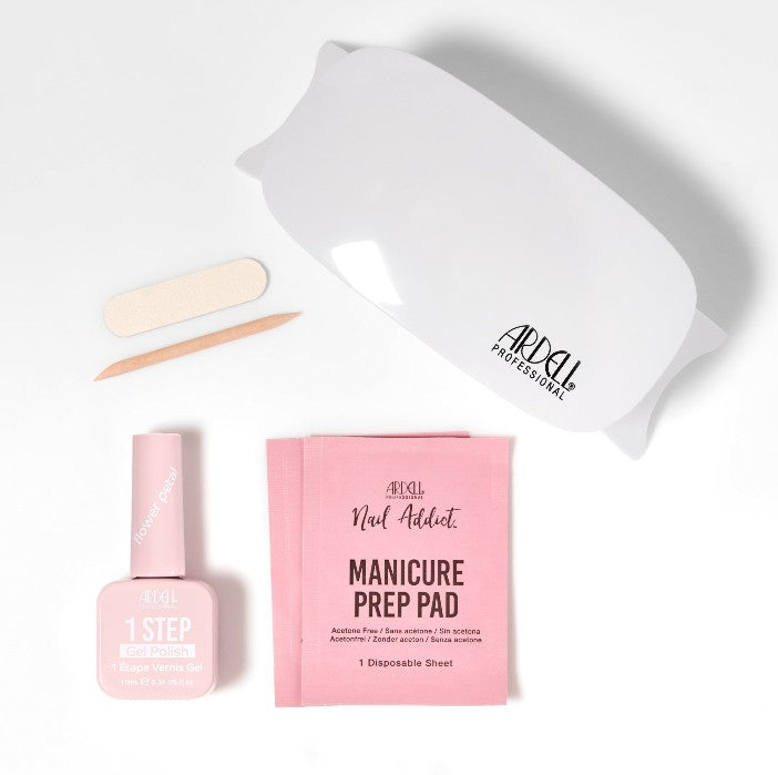 Contents of Ardell Flower Petal Starter Kit including LED lamp, polish, prep pads, and nail tools.
