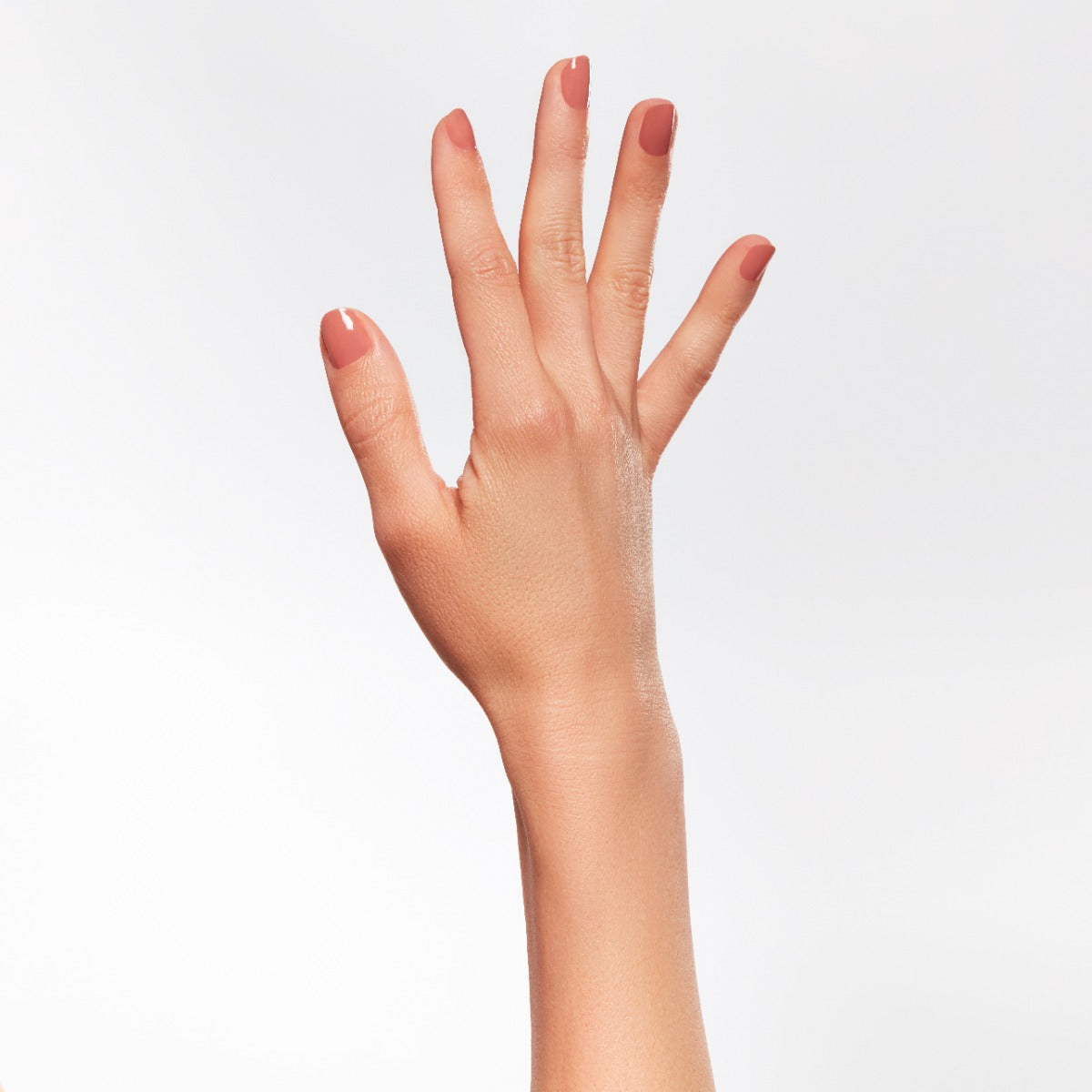 A woman hand with Ardell nail color