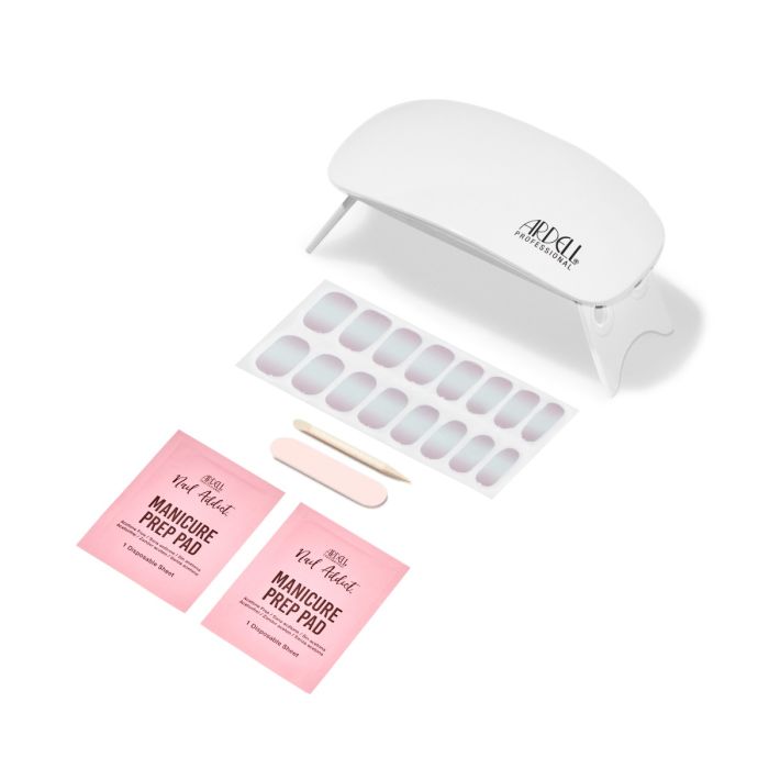 Nail Addict First Kiss kit components shown outside packaging for full product view.