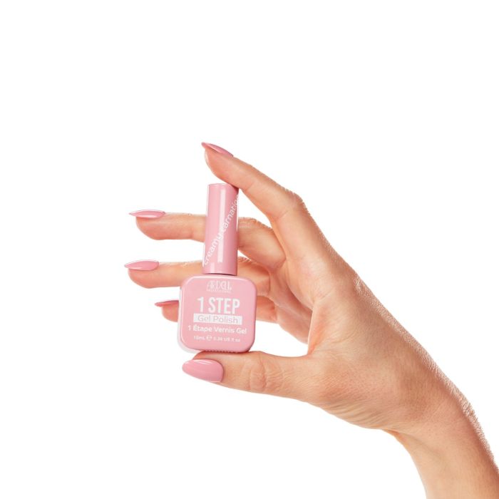 Close-up of nails painted in Creamy Carnation by Ardell, a soft, creamy pink gel polish.