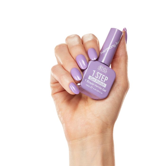 Hand model wearing Ardell Harmony Haze polish, featuring a creamy pastel lavender manicure with a cool undertone.