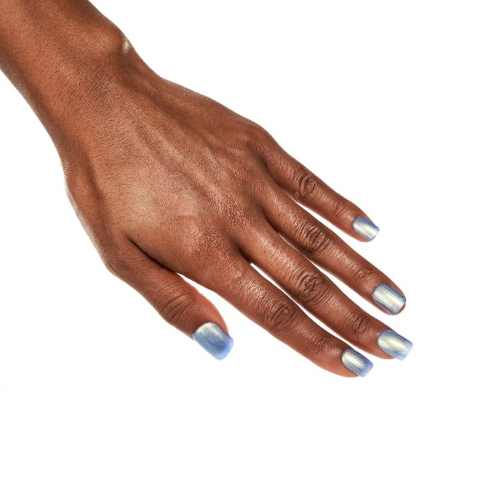 Model hand in Ardell Violet Flame polish, showing soft purple shimmer for an elegant nail look.