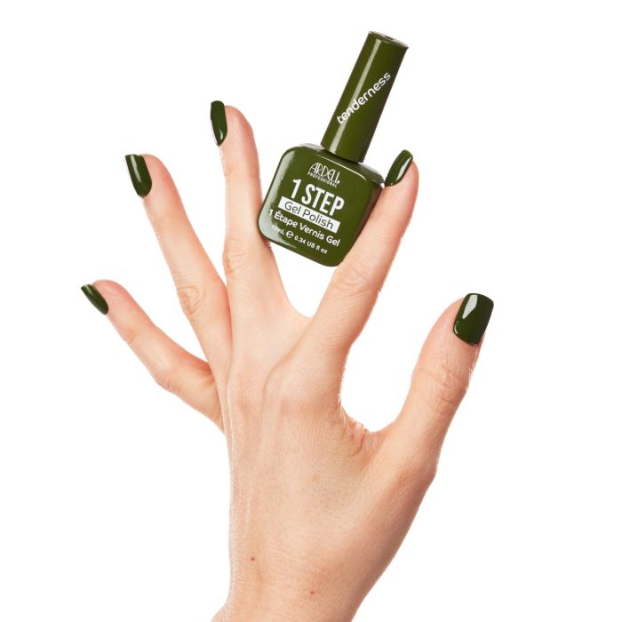 Hand model wearing Ardell Tenderness gel polish, featuring a rich olive green manicure with a glossy finish.