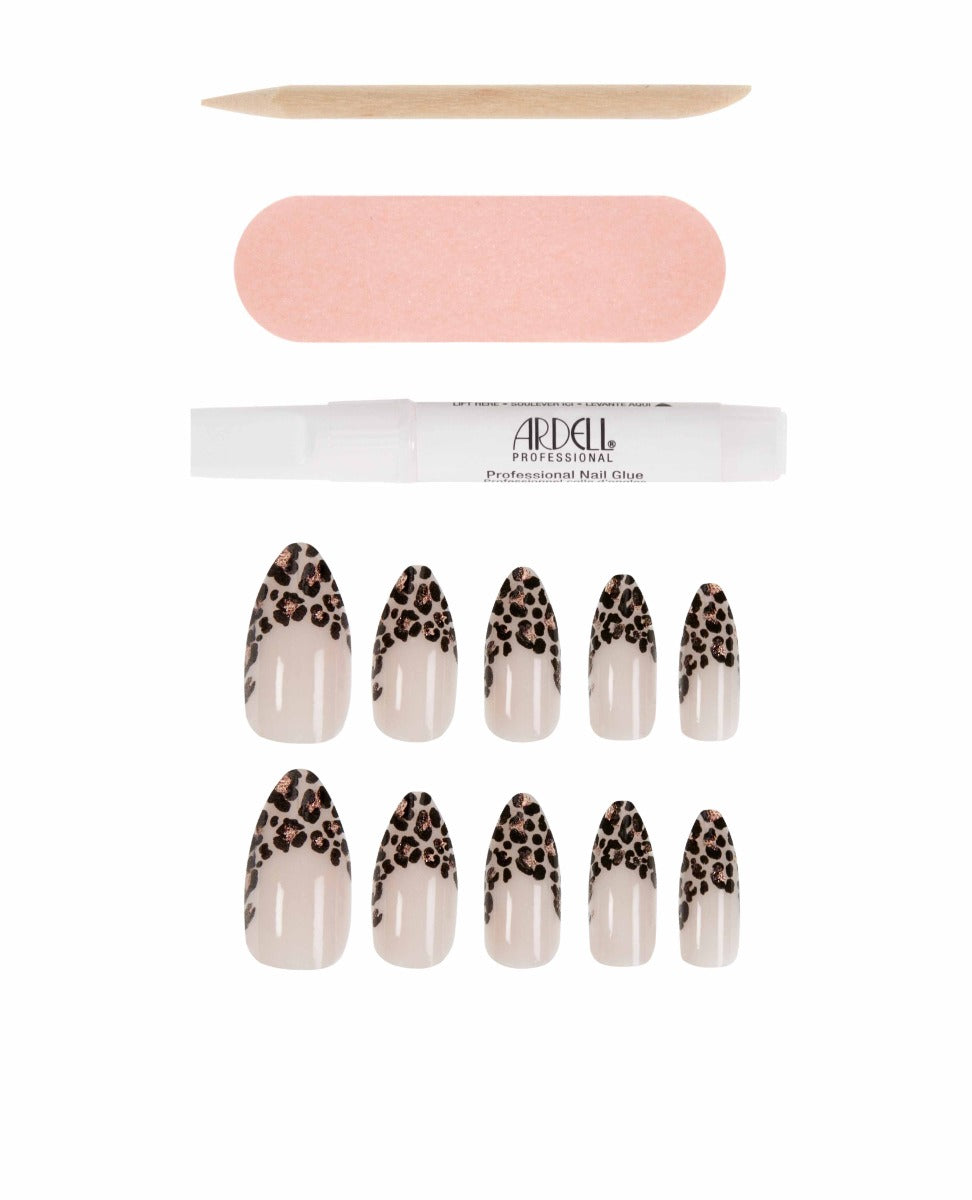 Nude press-on nails with leopard print tips and nail glue kit, perfect for bold nail looks.