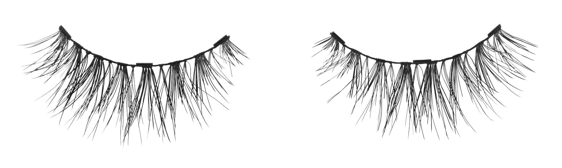 A close up of a pair of Ardell Wispies Magnetic Single False Lashes featuring tiny magnets & clustered lash fibers