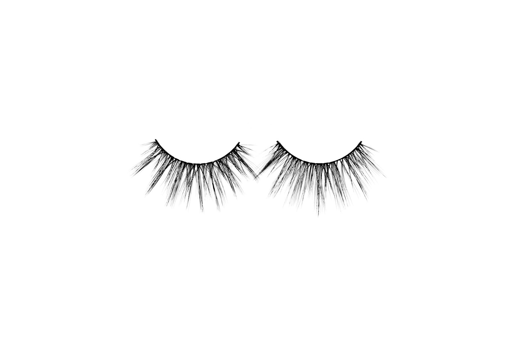 1 pair of lashes on a white background 
