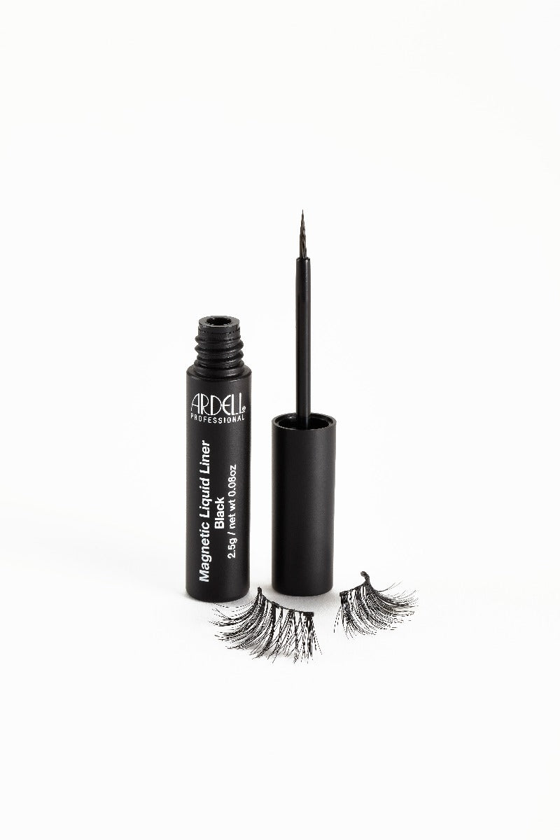 Uncapped Ardell, Magnetic Liquid Liner bottle side by side with st&ing brush cap with Accent 002 false lashes below 