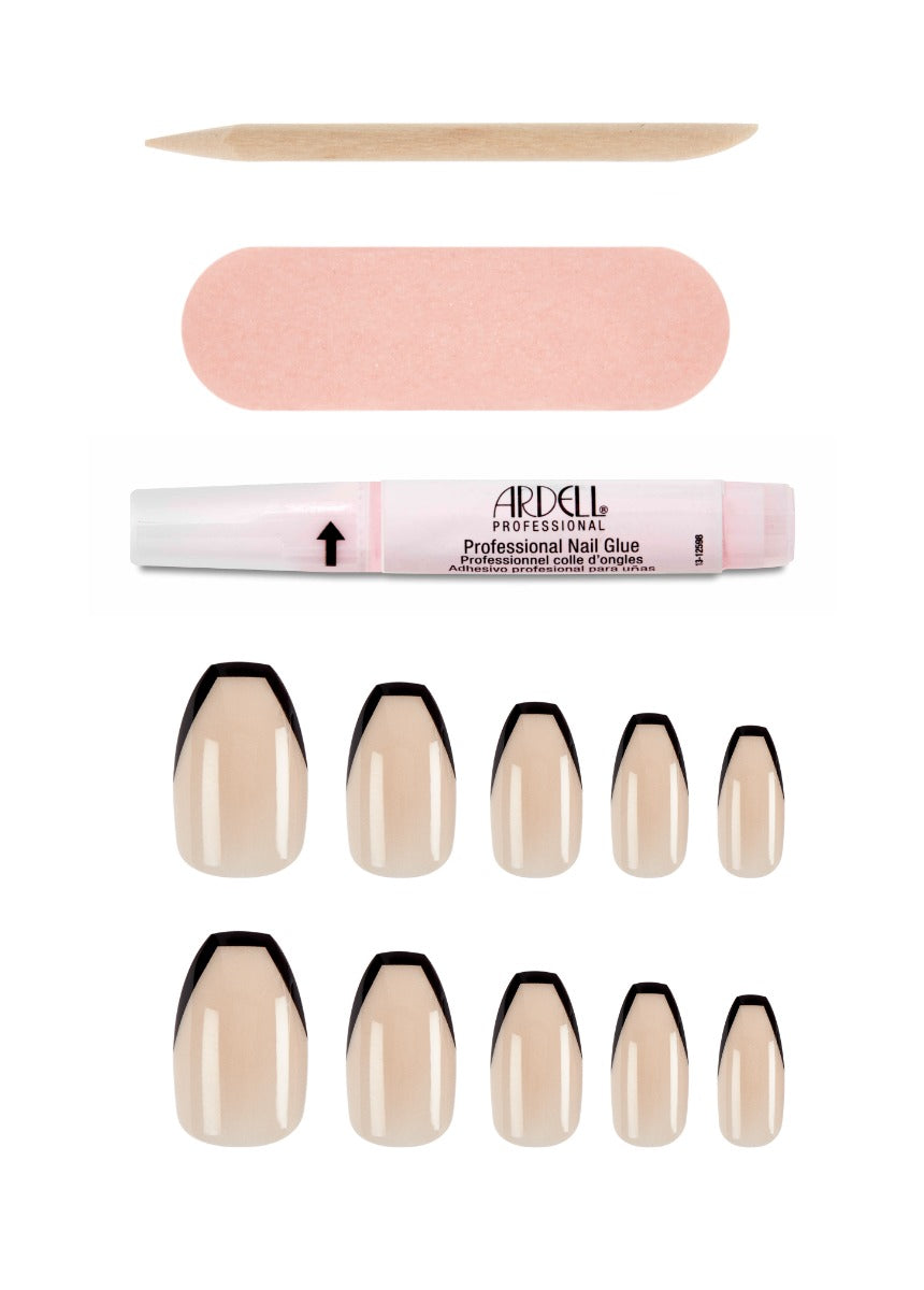 Ardell nude press-on nails with glossy black tips, glue, nail file, and wooden cuticle stick.
