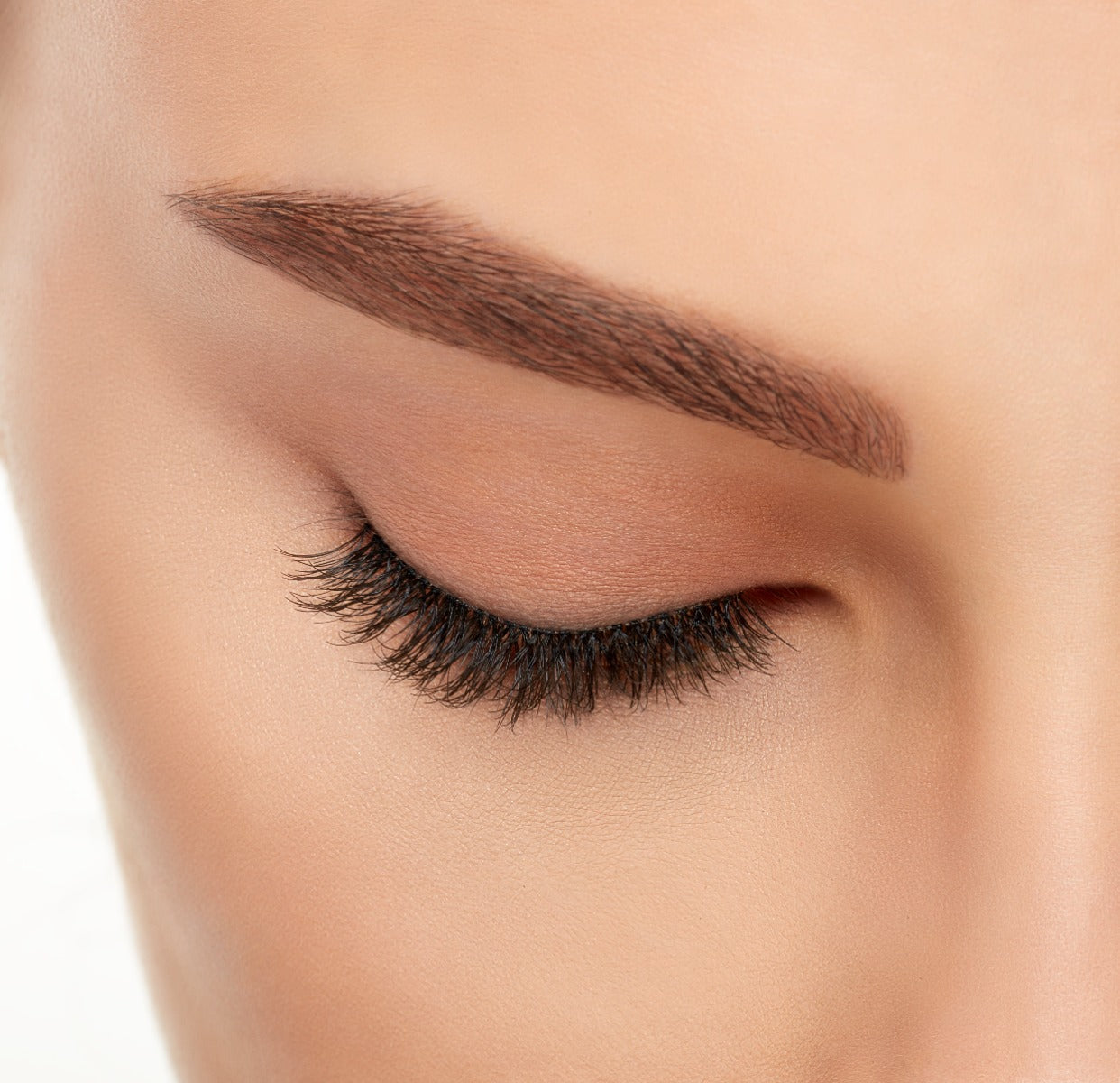 Ardell's Magnetic Naked Liner & Lash 420 on a closed right eye featuring its subtle volume and length
