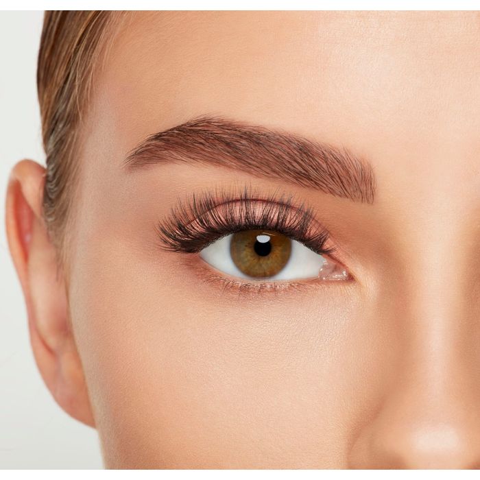 Close-up of model's eye wearing Ardell 3D Faux Mink 858 Lashes for a voluminous, fluttery look.