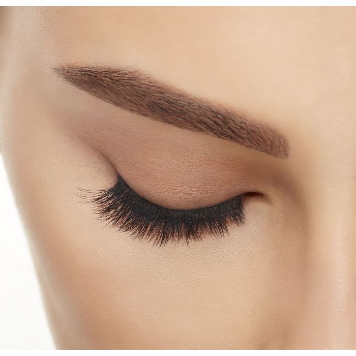 Model with eyes closed wearing Ardell 3D Faux Mink 859 Lashes, highlighting dense lash volume.