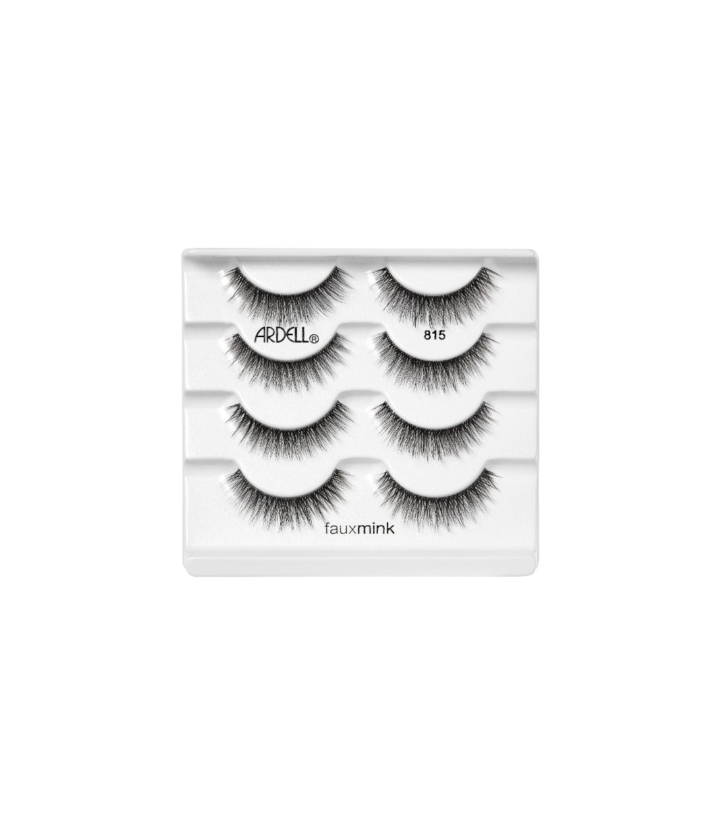 Four pairs of Ardell Fauxmink Lash 815 placed outside from its retail packaging 