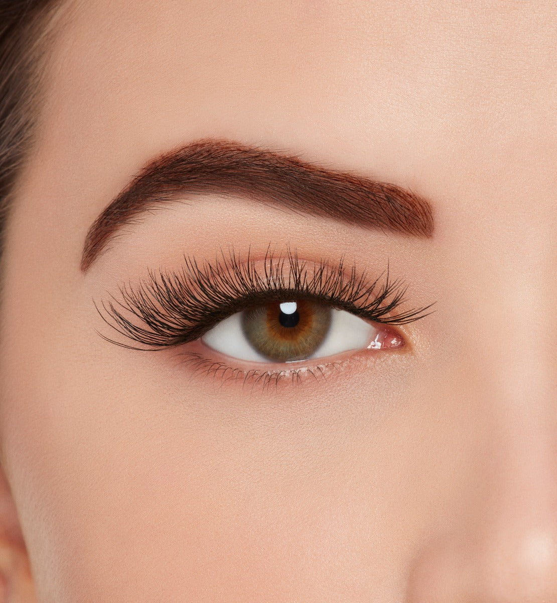 Front view of a model wearing Ardell Active Lash Soak It Up  lashes