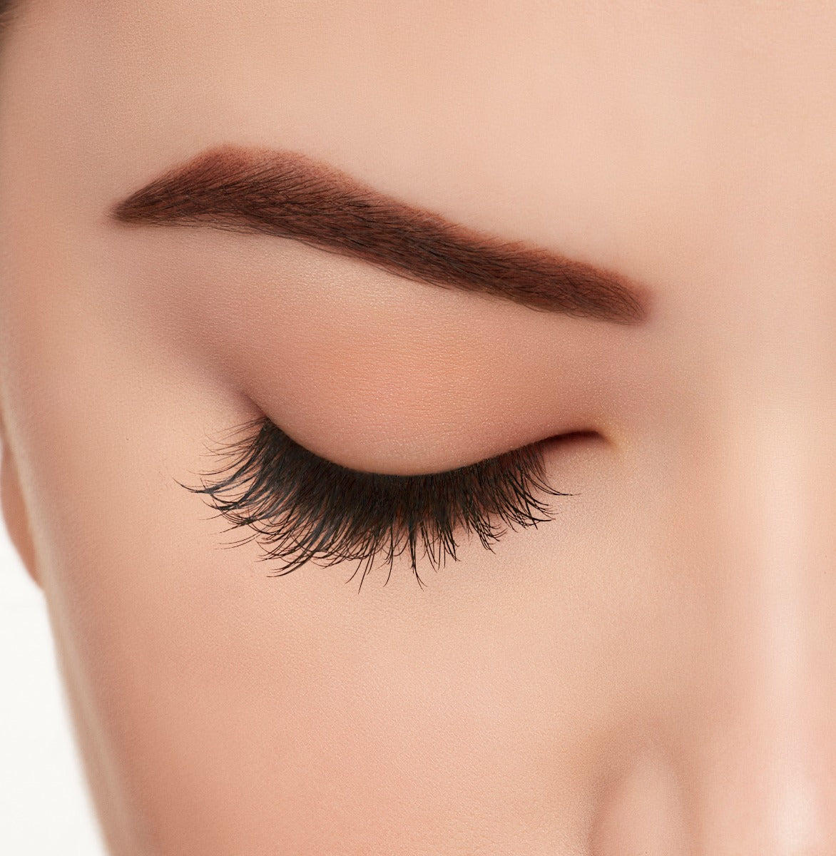 A model with close eye wearing Ardell Active Lash Gainz  lashes