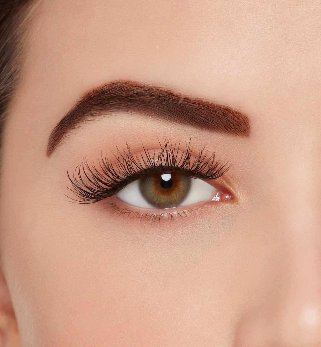 Front view of a model with wearing Ardell Active Lash Physical lashes to show how they look on the eye