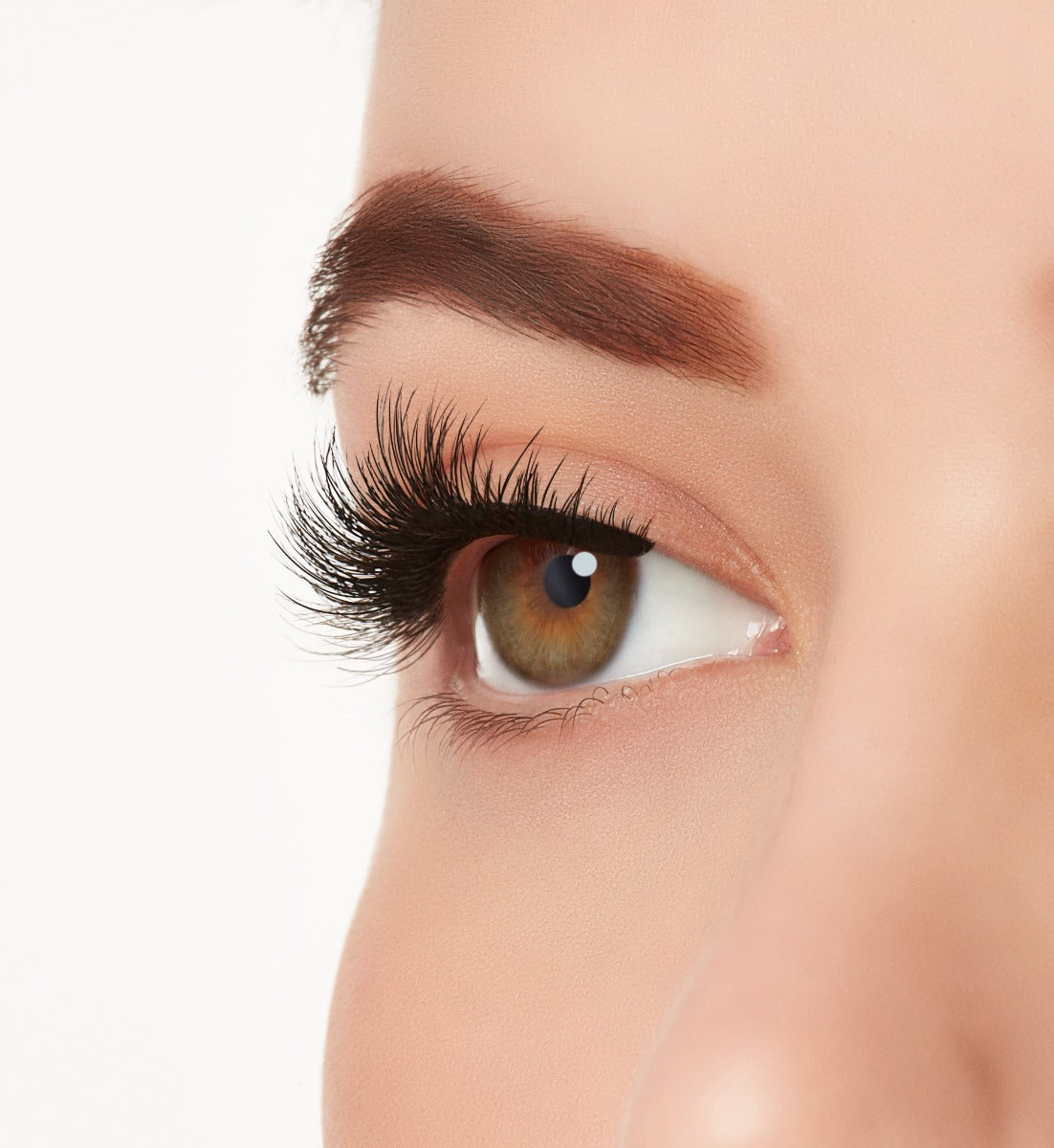 Side view of a  model wearing Ardell Active Lash Pump'n lashes to show how they look on the eye