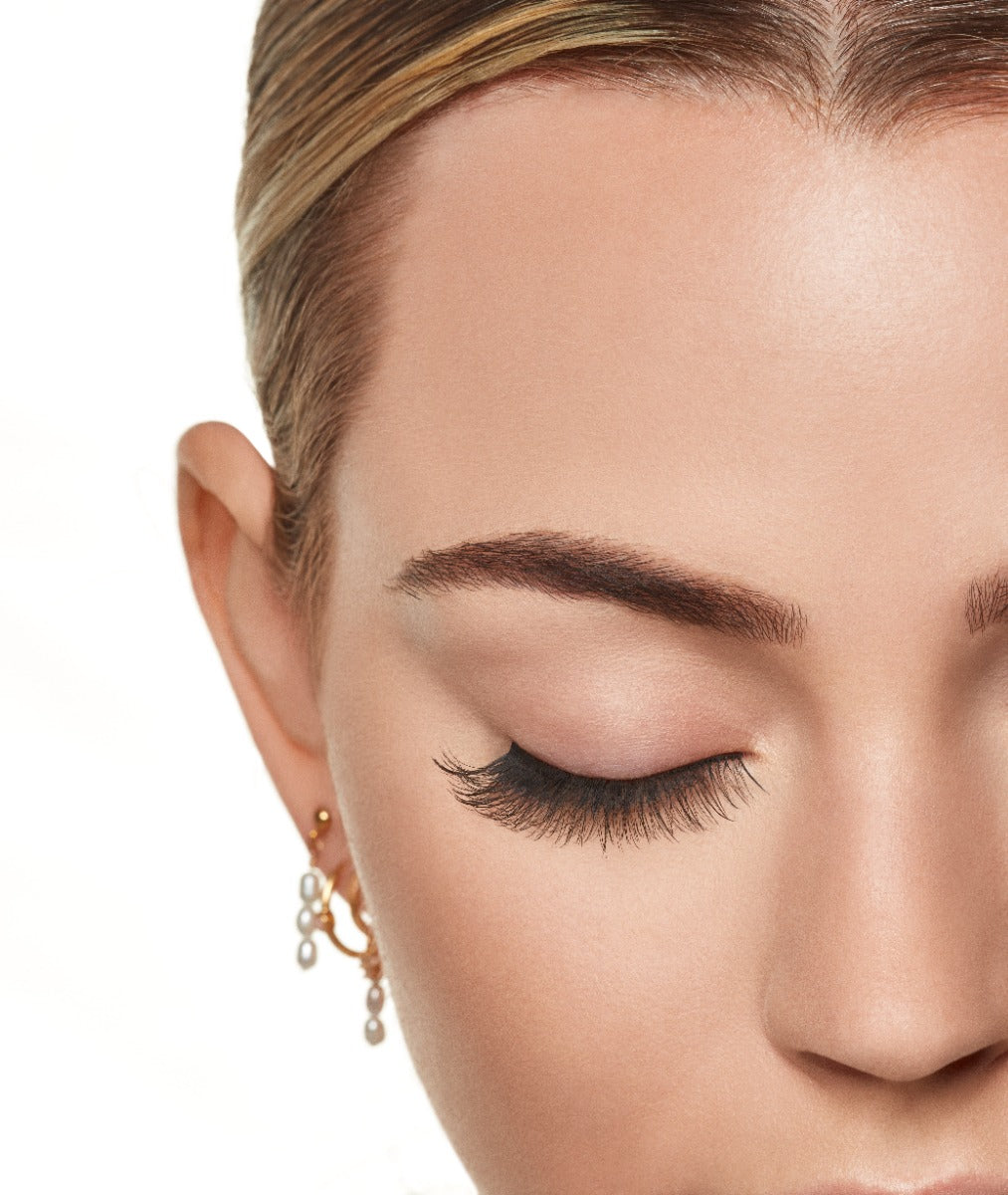 Model eye shot with eye closed wearing Winks Self Adhesive Haze lashes 