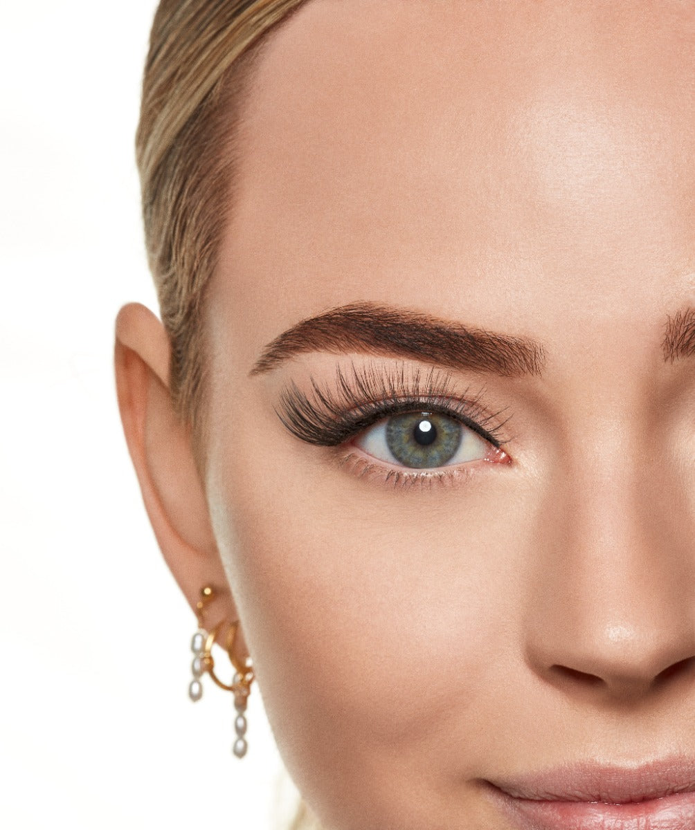 Open eye model shot wearing Winks Self Adhesive Haze lashes 