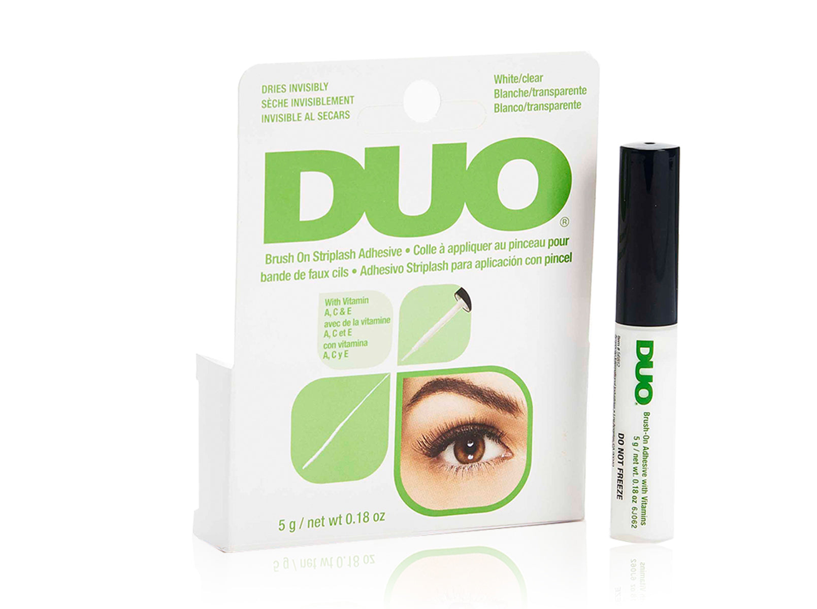 DUO Brush-On Strip Lash Adhesive with Vitamin A, C, E in green packaging.