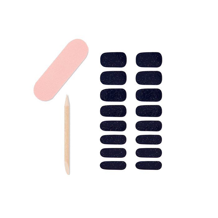 Ardell Midnight Sky nail strips with file and cuticle stick for a long-lasting, no-lamp manicure at home.